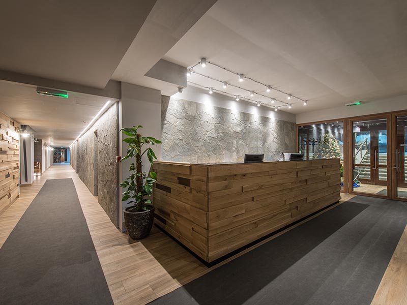Reception desk and view on hallway in modern hotel